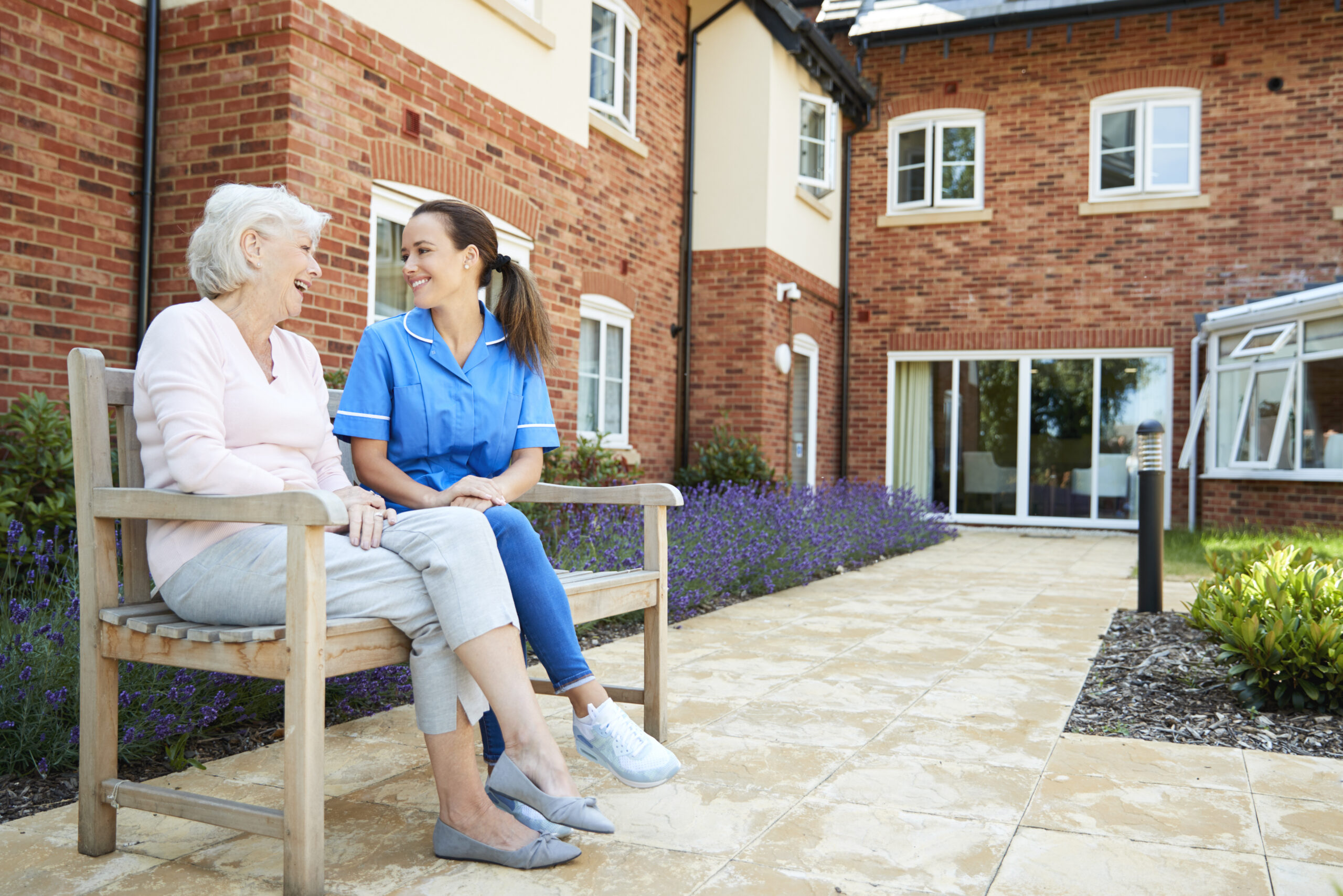 Happy elderly woman thanks to The Senior Living Locators